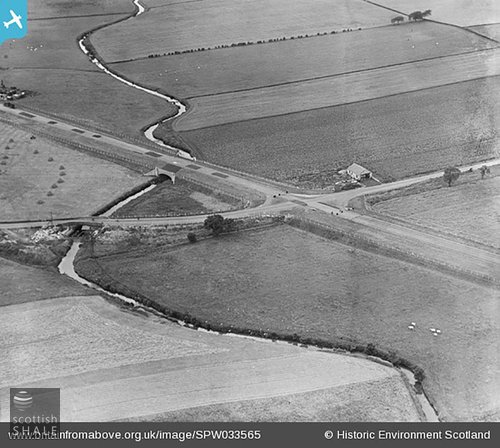 Aerofilms image taken in 1930, with a small garage on the site that became the Roadhouse / Royal Regent, showing the A8 bridge and bridge on the road from Whitburn to Armadale.