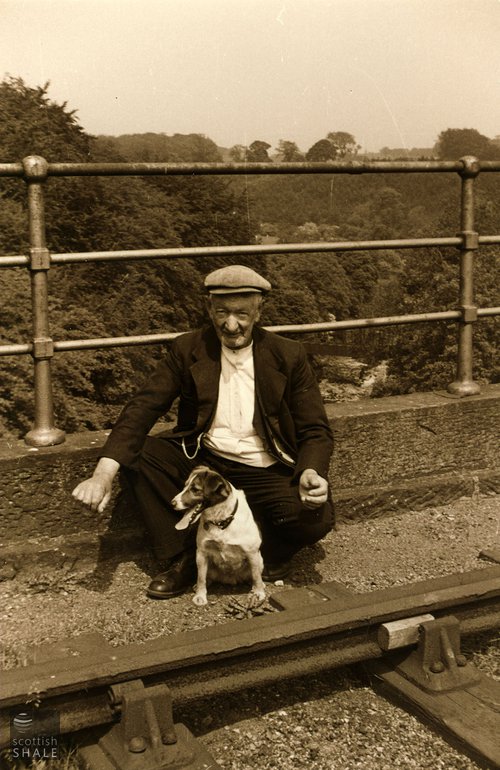 Pumpherston man Dave Spat, and dog, pictured on the viaduct in 1957.