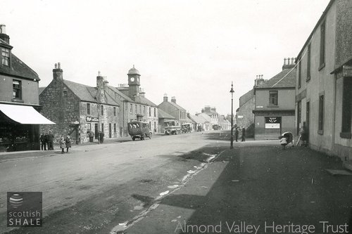 Whitburn Cross, c.1928, with David Morrison&#x27;s Cross Tavern on the right and the site of the Whitburn Inn beyond it.